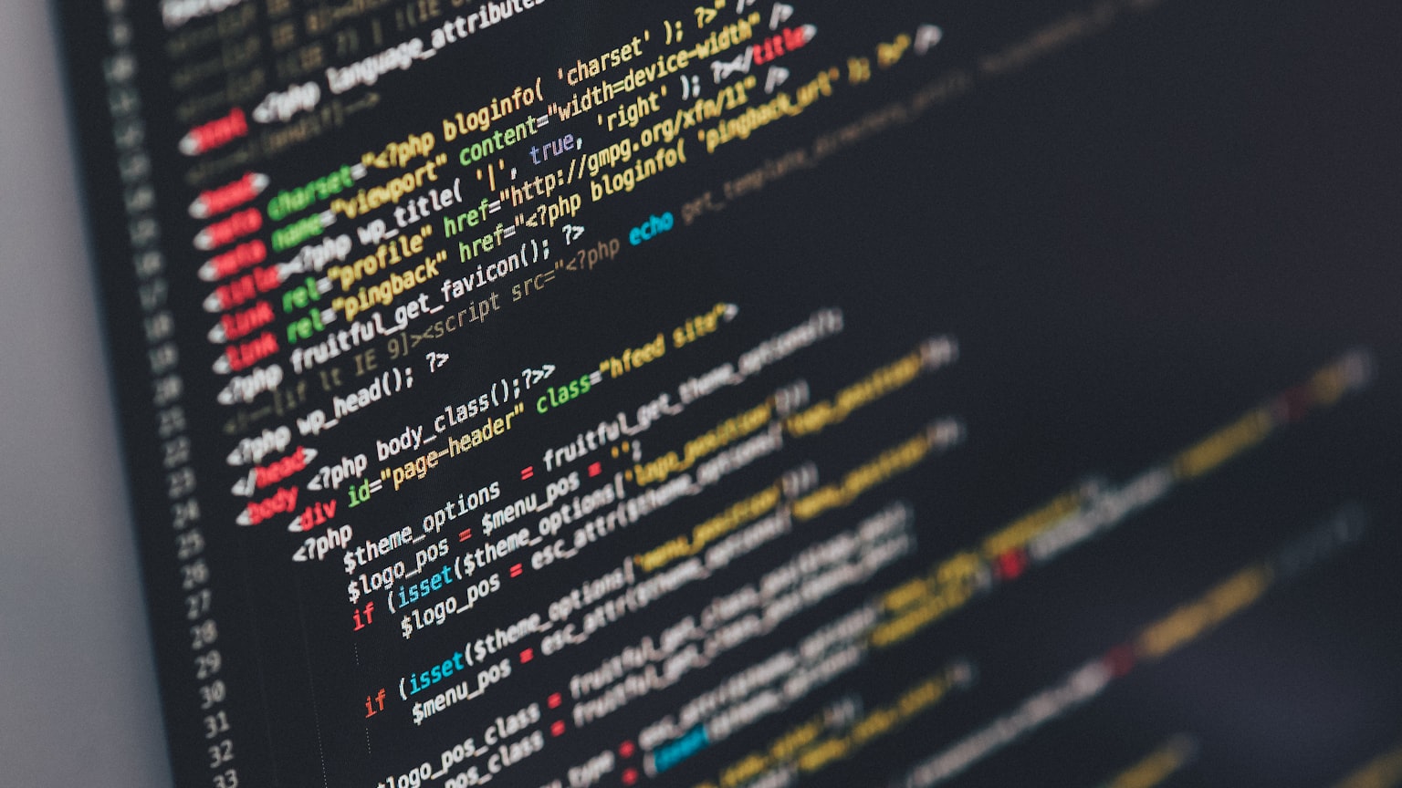 Colorful TypeScript source code on a dark screen, representing a Claude agent loop running concurrent tool calls