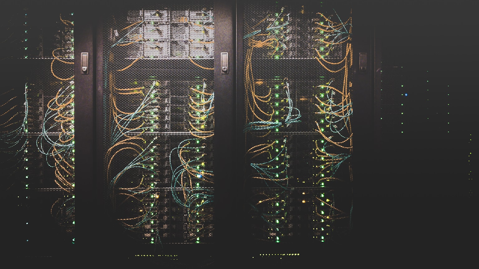 Rows of dark server racks lit in blue, representing durable long-term memory an AI agent stores on disk
