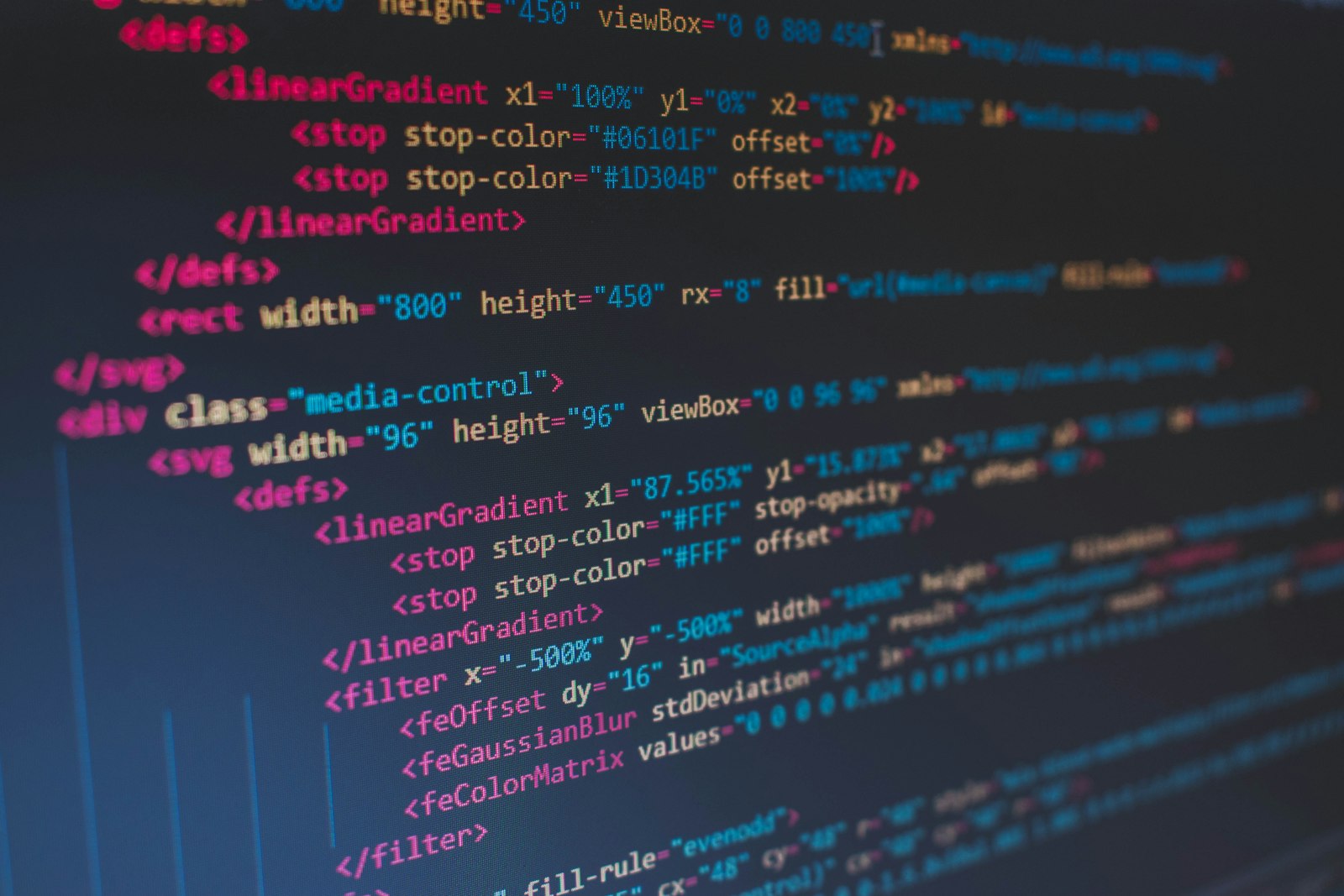 Close-up of syntax-highlighted code on a dark screen, representing structured JSON output from a Claude model